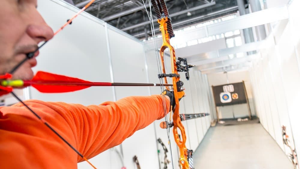 a bow drawn in an indoor range