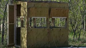 a ground blind made of wood