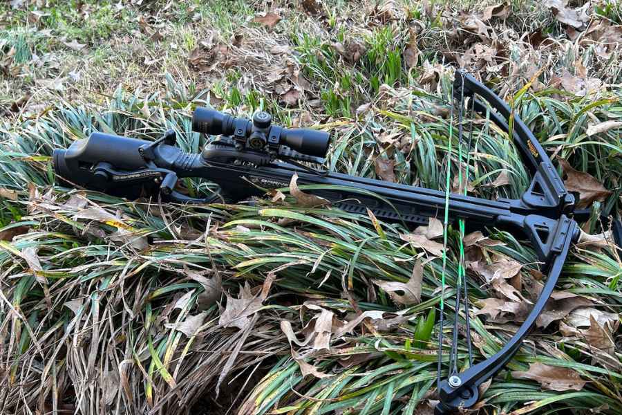 A crossbow in the grass